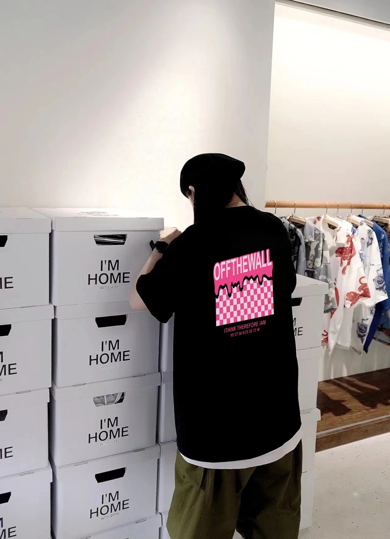 VANS Womens Graphic T-Shirt in Black with 'OFF THE WALL' print and checkered pattern on back