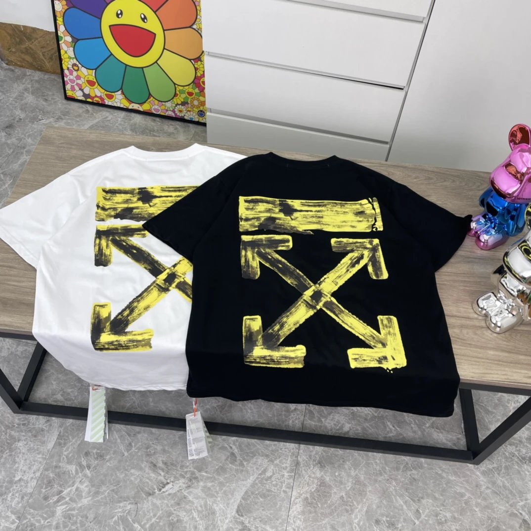 White and Black T-shirts with Yellow Arrow Print on Back