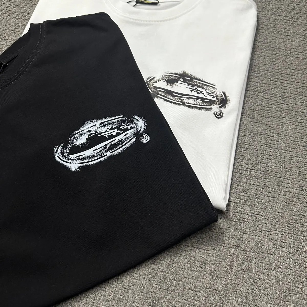 Corteiz Island Stencil Tee White Mens Short Sleeve Cotton T-shirt with oval graphic print